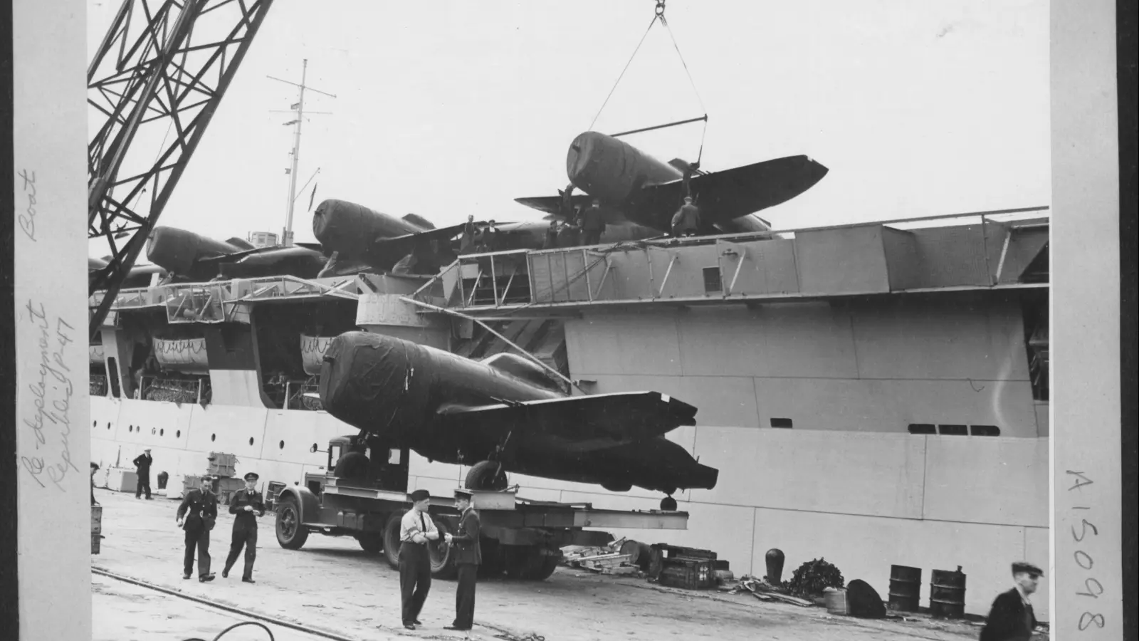 Planes being loaded onto a boat at Liverpool Docks